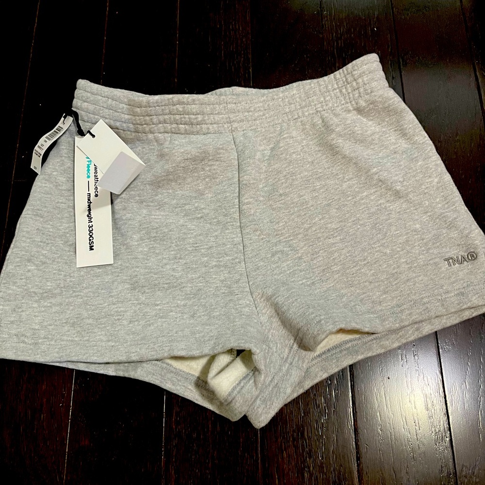 Aritzia TNA girl/women grey shorts. Brand new with tags.